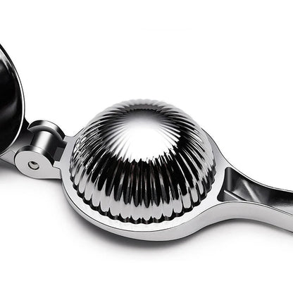 A high-quality manual lemon squeezer made of stainless steel for extracting fresh citrus juice