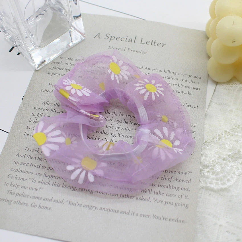 Handmade floral elastic hair bands with soft chiffon fabric and vibrant embroidered daisy patterns, perfect for enhancing everyday style in the UK.