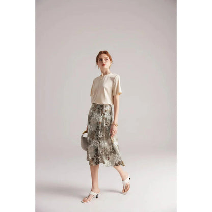Elegant women's summer tee made of premium mulberry silk with classic O-neck design and short sleeves