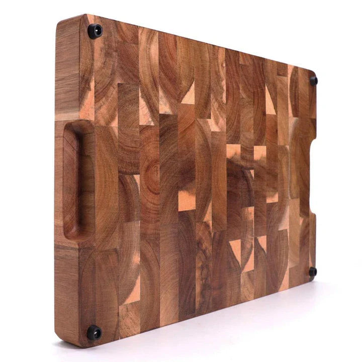 Premium Acacia wood chopping board with a convenient juice groove to catch liquids during food preparation