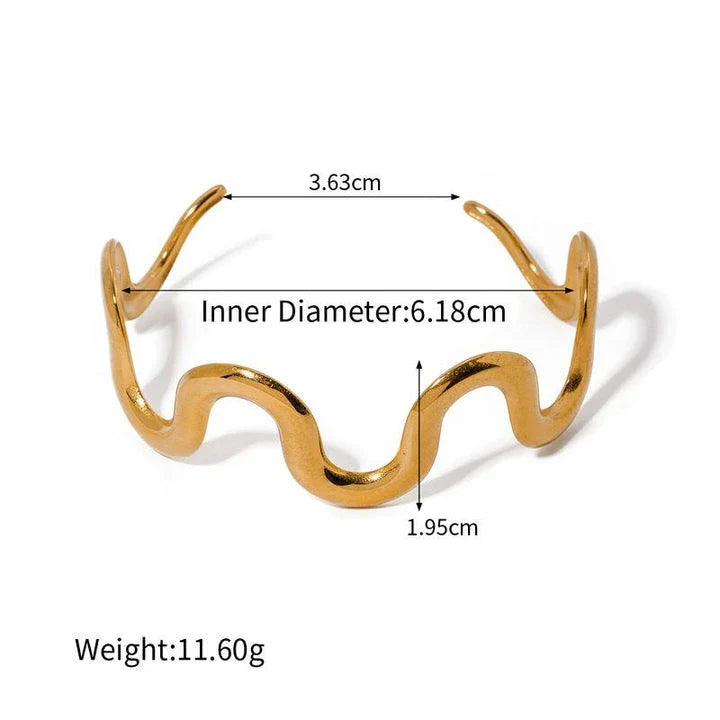 Elegant 18K gold-plated stainless steel wave bracelet and necklace set for women, showcasing a unique contemporary design with adjustable drawstring closure