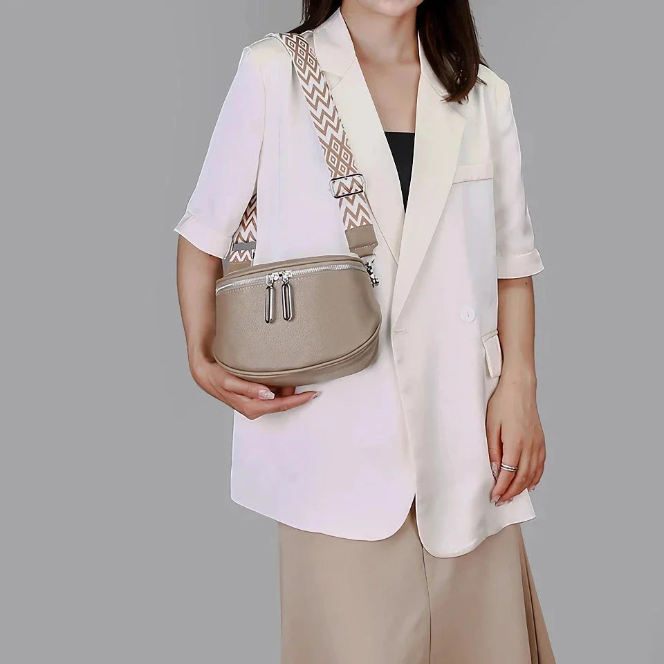Premium genuine leather tote bag with adjustable strap and interior compartments for fashion-forward women