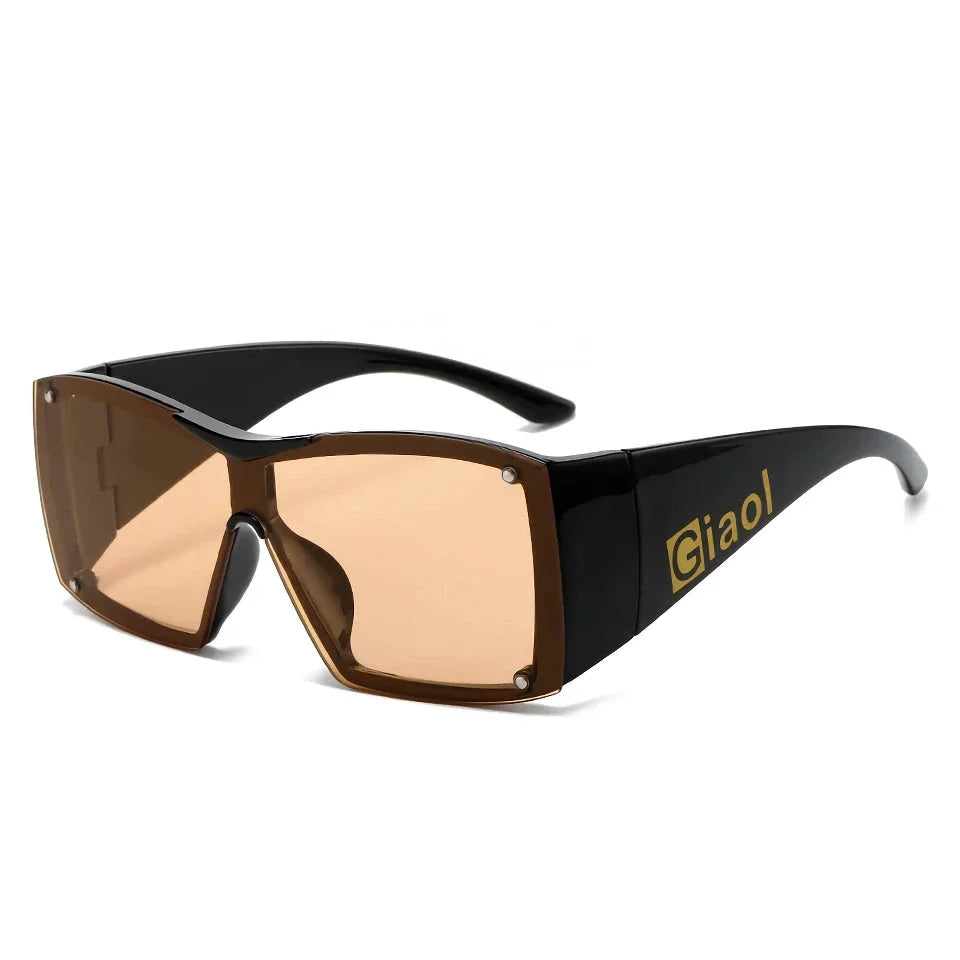 Oversized square sunglasses with black lenses and a durable plastic frame, offering UV400 protection and adaptive photochromic technology.