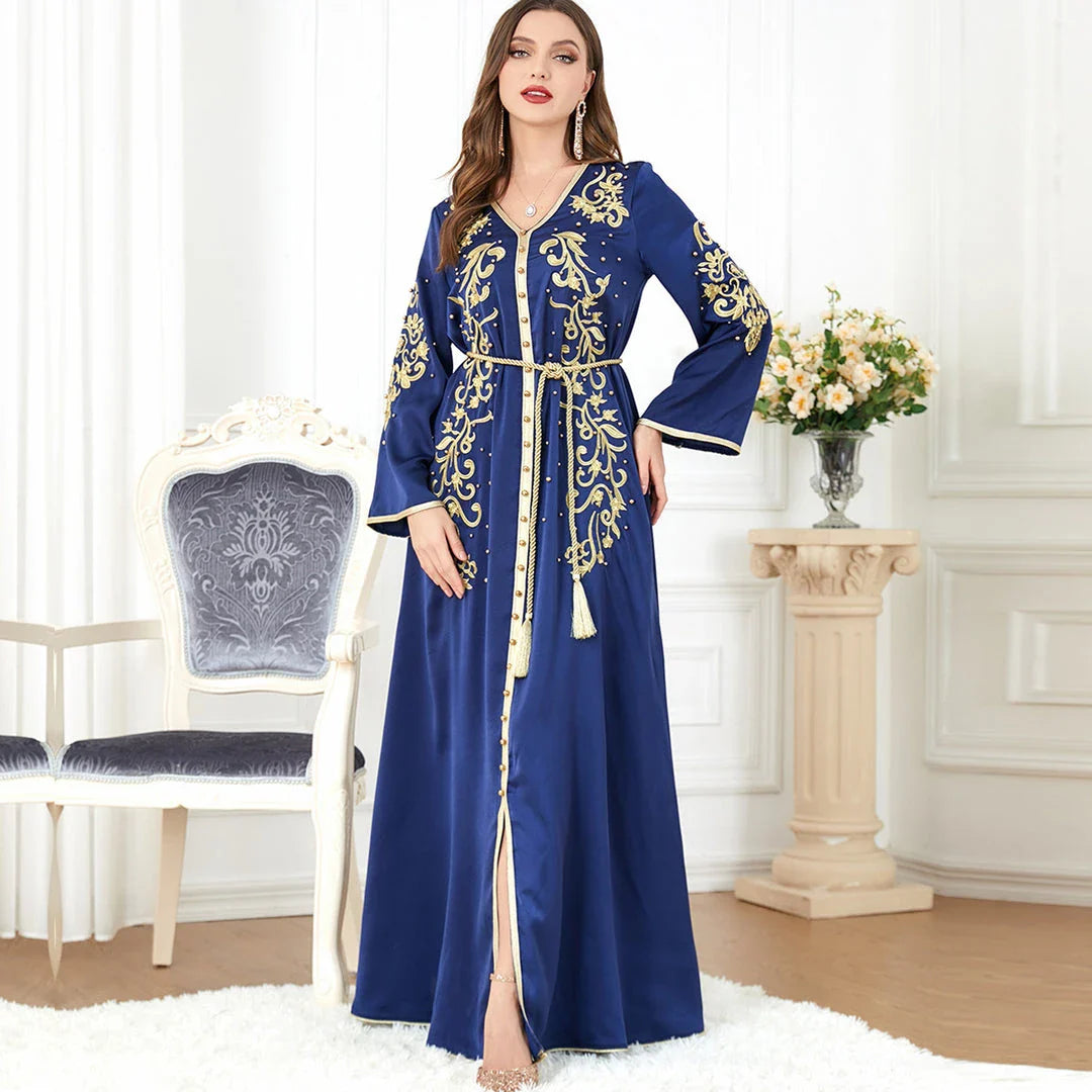 Elegant long-sleeve dress with floral embroidery in a sophisticated sapphire blue colour, suitable for British women