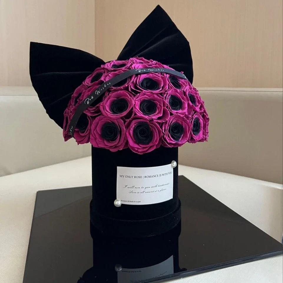 Elegant black plum bow flower pot with preserved plum blossoms, a sophisticated and long-lasting home decor piece