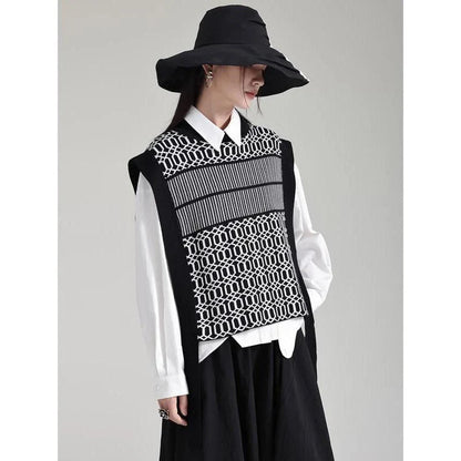 Women's black sleeveless vest with irregular knitting pattern, a versatile and stylish layering piece for the modern British woman