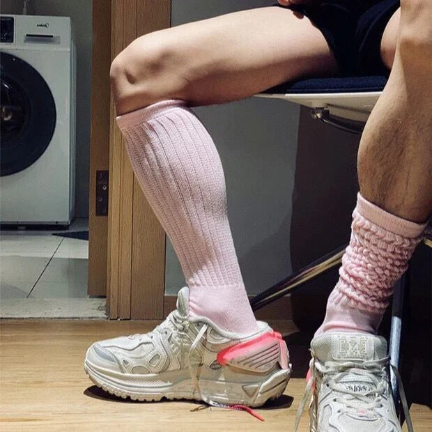 Premium men's breathable terry socks in various solid colours, offering superior moisture-wicking and comfort