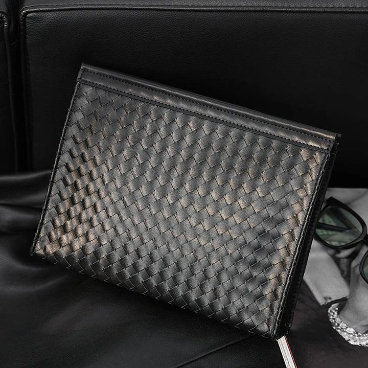 Premium hand-woven black leather briefcase with multiple pockets and adjustable shoulder strap