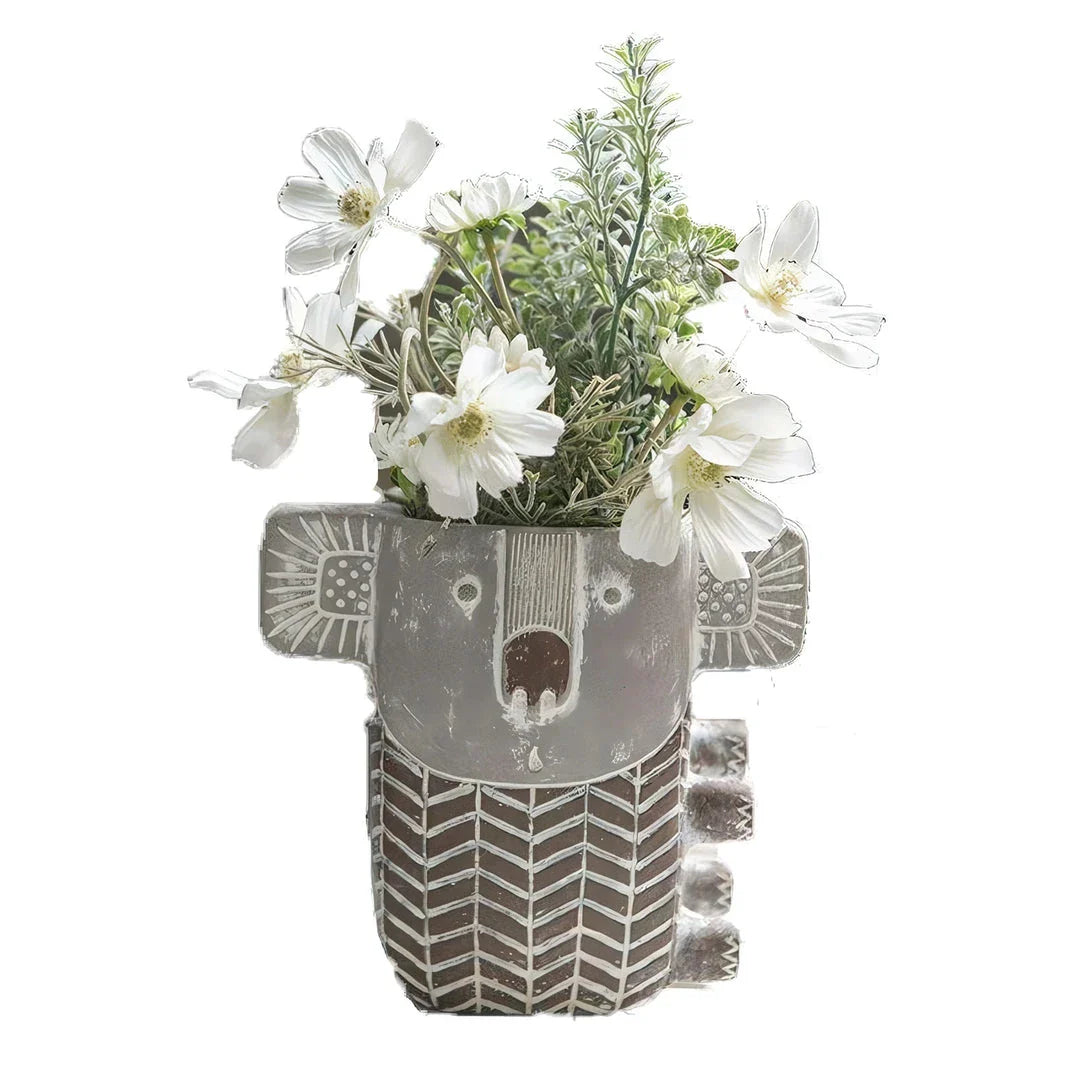 Charming retro koala-shaped cement planter for succulents and small flowers, available in two sizes
