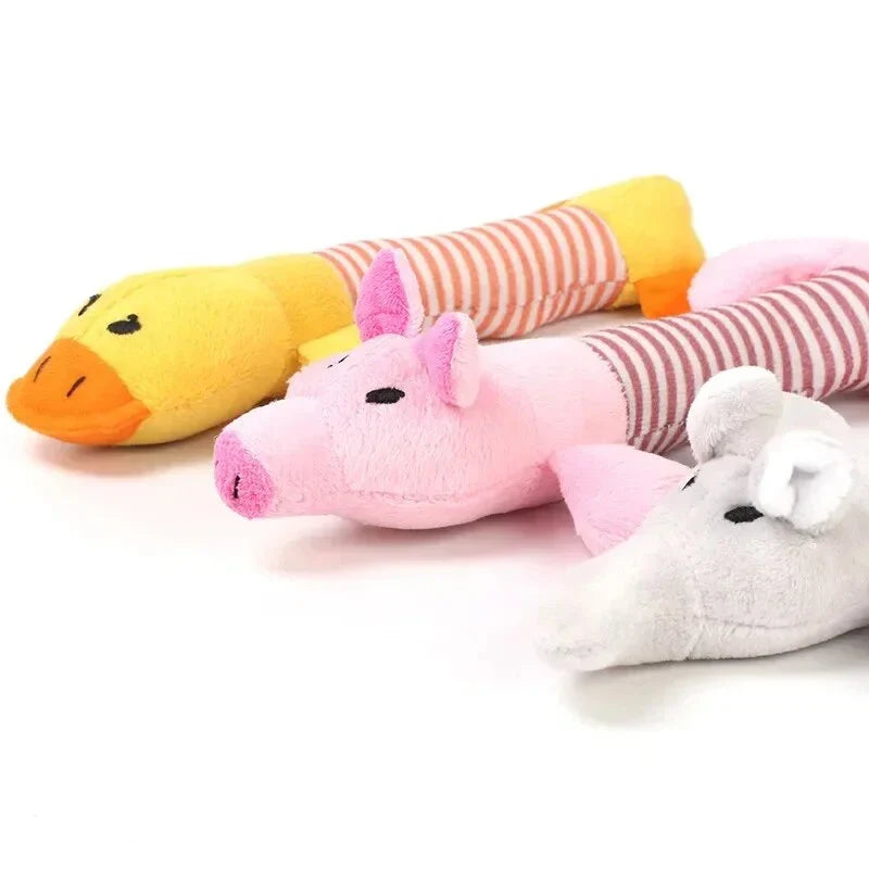 Premium plush squeaky dog toy in various colours, featuring textured stripes for dental cleaning and a built-in sound generator for interactive play.