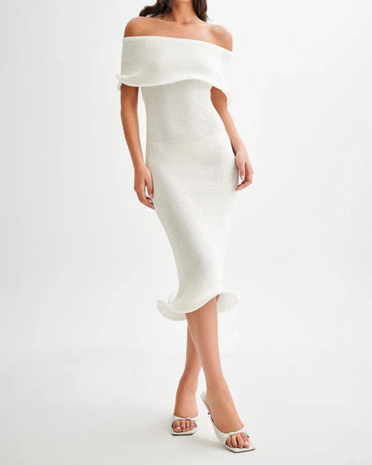 Chic white sleeveless dress with slim-fit silhouette, perfect for stylish occasions in the UK