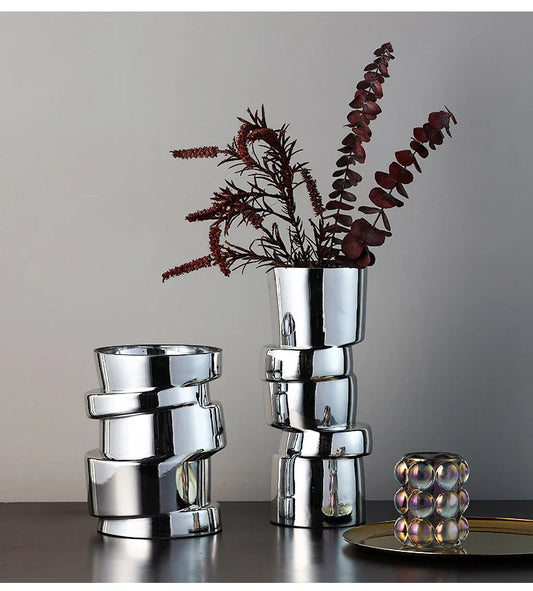 Electroplated silver glass vase with a modern, geometric design for home decor