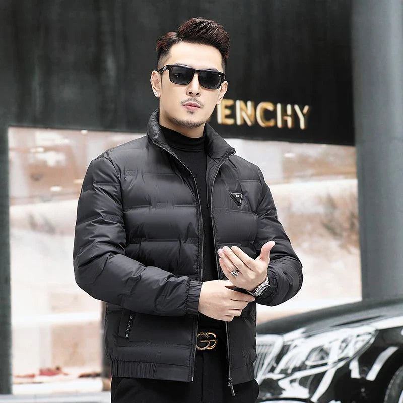 Warm and weatherproof men's down jacket with stand collar and knitted sleeves, made from premium polyester fibre and filled with luxurious duck down