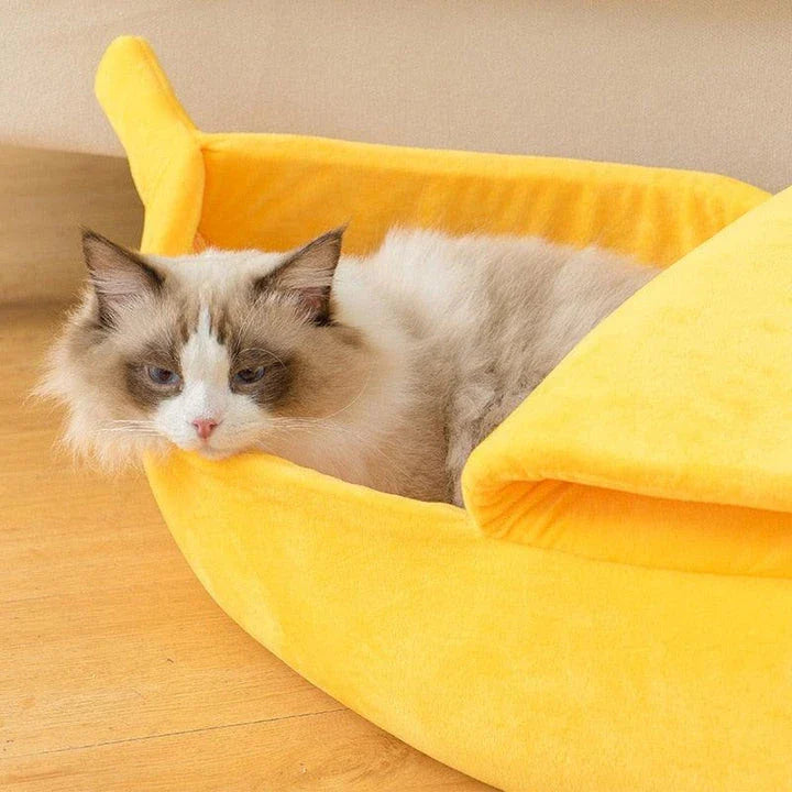 Cosy, plush banana-shaped cat bed in a variety of sizes, providing a comfortable retreat for feline friends