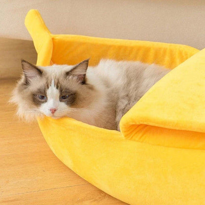 Cosy, plush banana-shaped cat bed in a variety of sizes, providing a comfortable retreat for feline friends