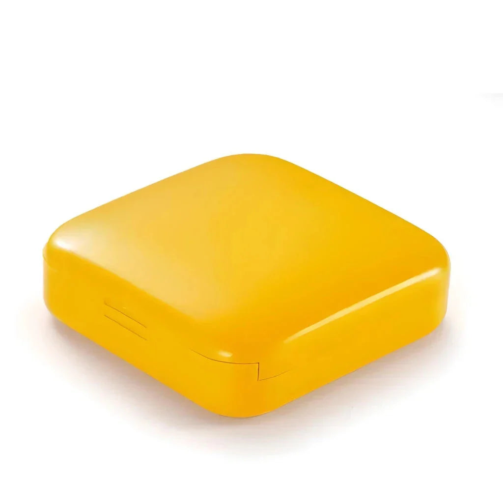 Compact and portable 2-grid mini pill box made of durable ABS plastic for organised medication storage