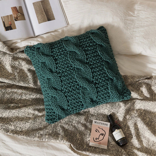 Luxurious hand-crocheted chunky knit throw pillow in a range of vibrant colours, providing cosy comfort and sophisticated style.