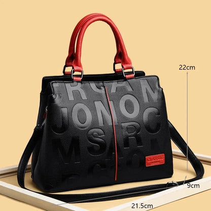 Sophisticated large leather tote bag with embossed lettering design, suitable for daily use and travel