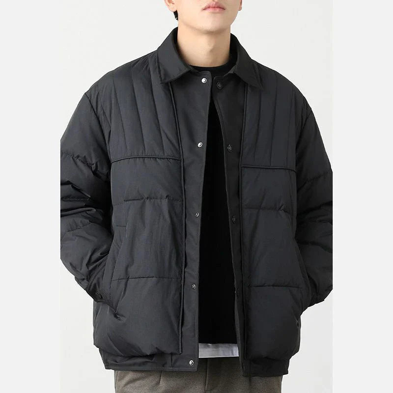 A premium lightweight down jacket in a sleek, tailored design for the stylish British gentleman