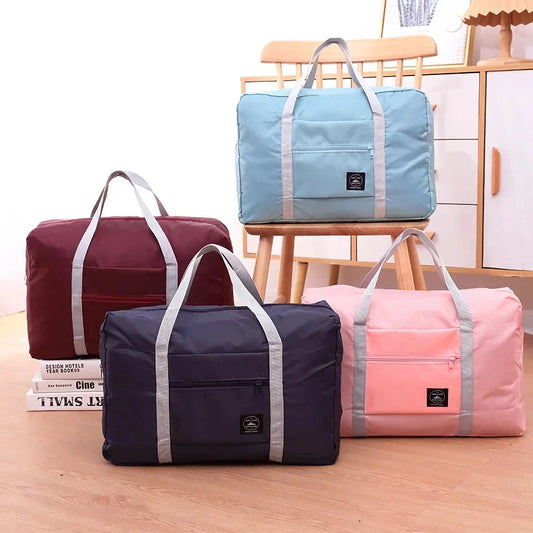 Premium foldable travel duffel bag in a solid colour design, with a large capacity and lightweight construction for women's travel needs.