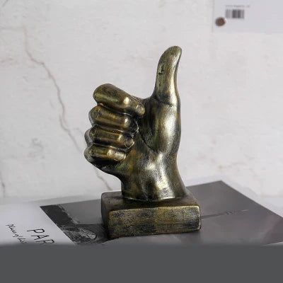 Elegant resin gesture ornaments in a variety of classic bronze and silver finishes, perfect for adding a charming accent to British-inspired home decor