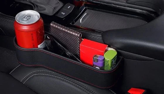 Premium multifunctional car seat organiser with various compartments for storing phones, chargers, pens, and other car essentials