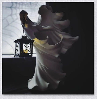 Chillingly elegant Halloween witch/ghost resin statue with eerie illumination, a unique blend of spooky charm and refined artistry for unforgettable seasonal decor