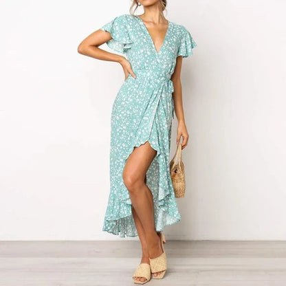 Elegant V-neck short-sleeved lace dress in a flattering silhouette, featuring delicate lace details and a blend of European and British fashion influences.