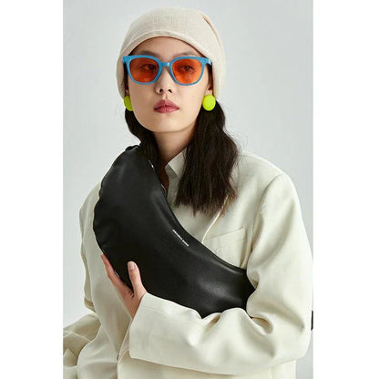 Stylish leather crossbody fanny pack with vintage half-moon design, perfect for everyday use in the UK