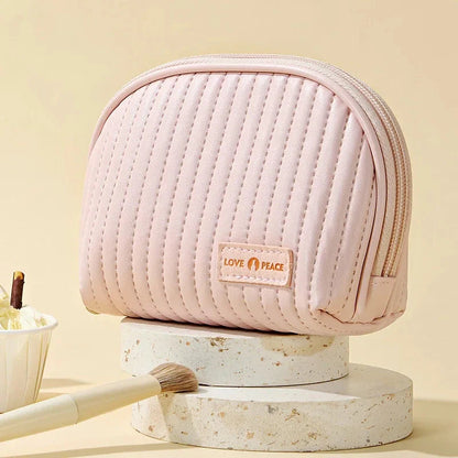 Compact Shell Cosmetic Bag for Women - A stylish and functional makeup pouch for the modern British woman