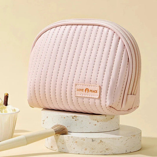 Compact Shell Cosmetic Bag for Women - A stylish and functional makeup pouch for the modern British woman