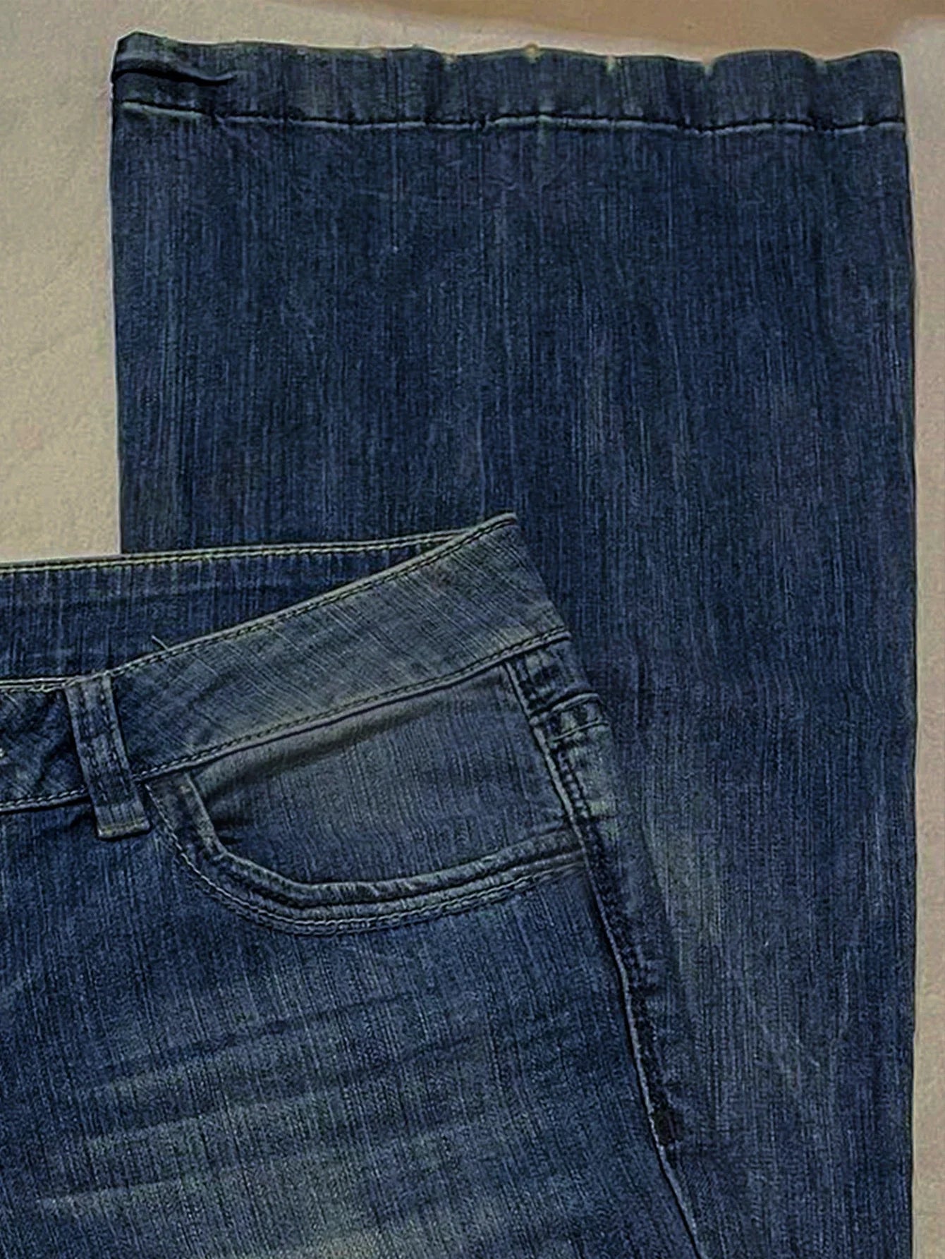 Premium British denim skinny jeans with a tailored fit, stretch fabric, and timeless blue wash