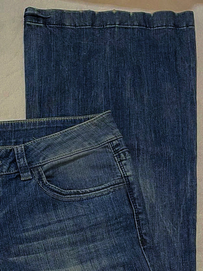 Premium British denim skinny jeans with a tailored fit, stretch fabric, and timeless blue wash