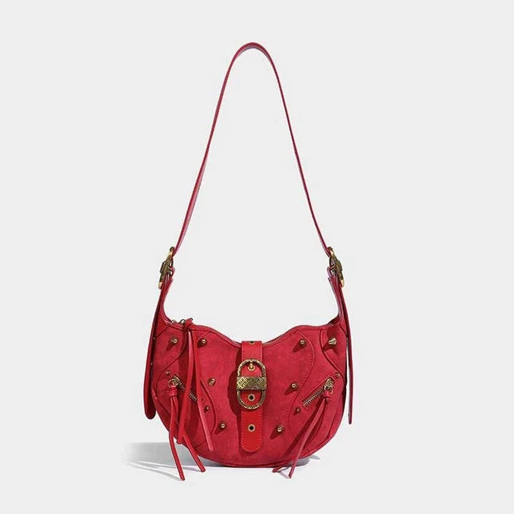 Stylish pink leather sling crossbody daypack with adjustable strap and smooth zipper closure