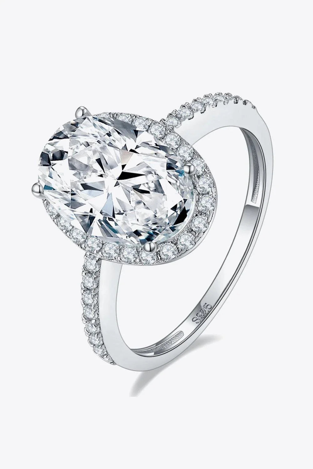 Elegant 4.5 carat moissanite halo ring in sterling silver with platinum plating, showcasing a captivating centre stone and delicate gem-studded design
