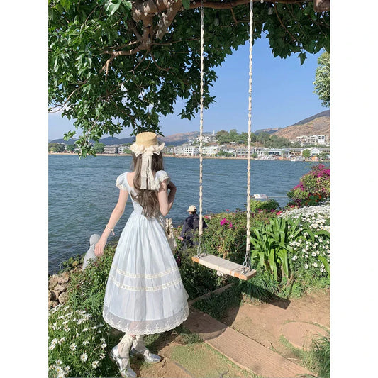 Elegant lace bow blue long dress for stylish ladies, featuring a high-waisted design and sleeveless silhouette for a sophisticated formal look.