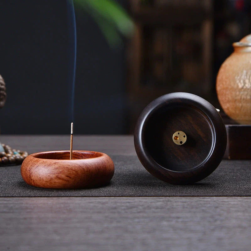 Elegant black sandalwood incense holder with four different caliber sizes to accommodate various incense sticks