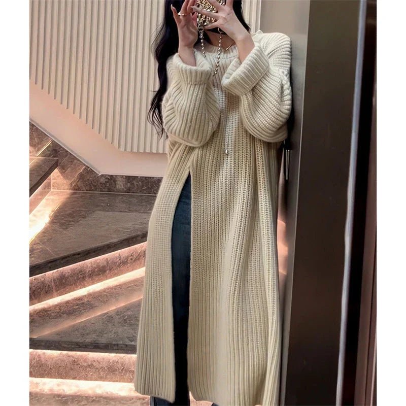 Relaxed mid-length jumper dress in a variety of colours, featuring an A-line silhouette and premium knit fabric for a comfortable, flattering fit.