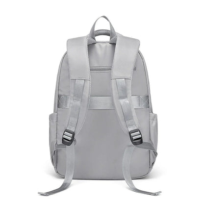 Premium leather backpack with dedicated laptop compartment, soft handles, and arcuate shoulder straps for modern women
