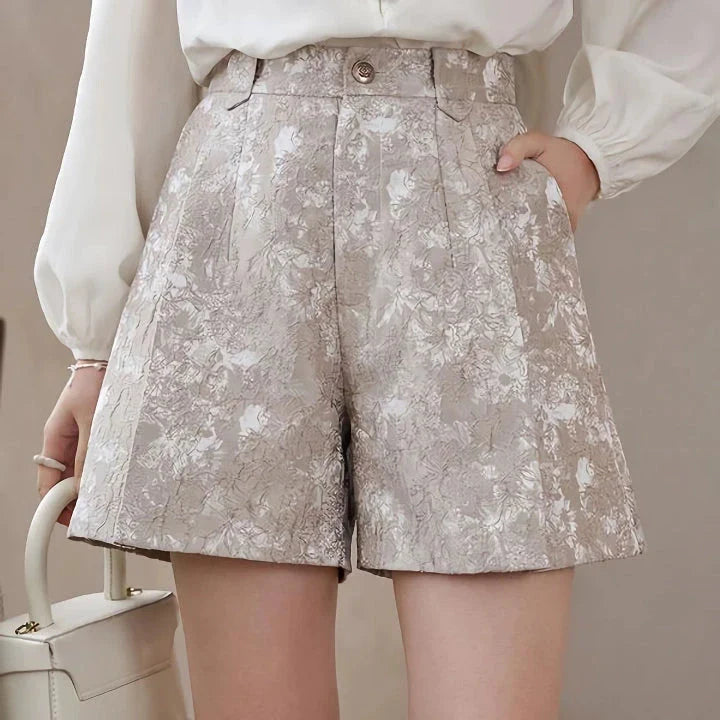 Elegant high-waisted floral jacquard A-line shorts with chic metal buttons, perfect for any occasion