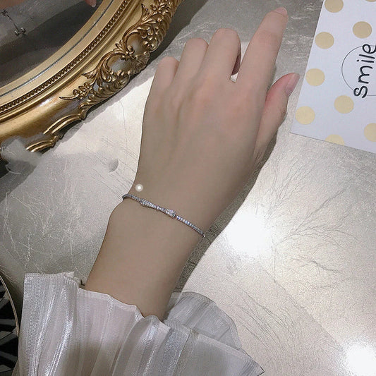 Elegant 925 sterling silver bow bracelet with minimalist design for stylish women