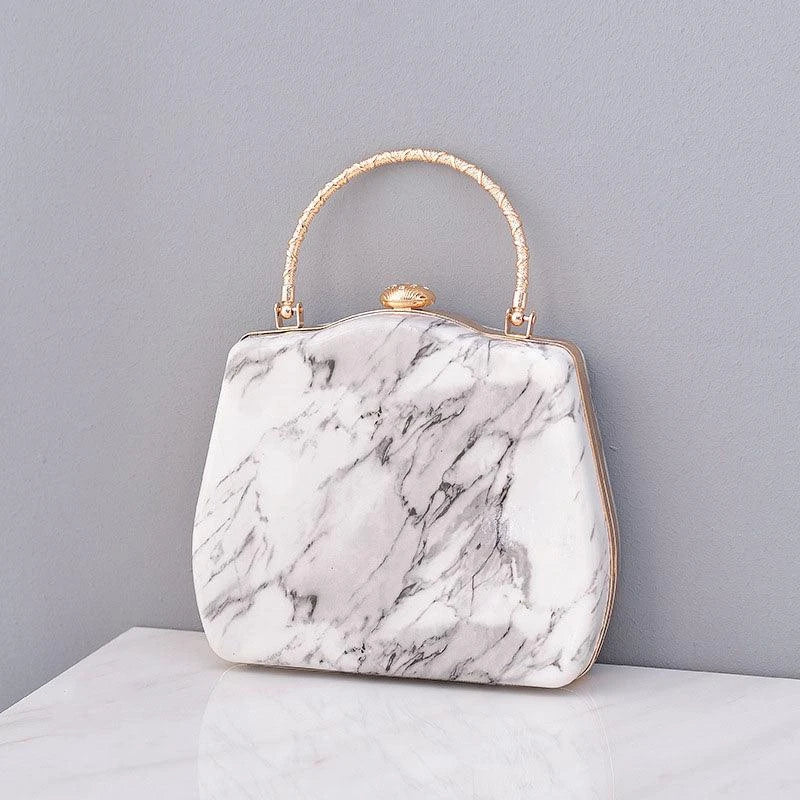 Premium marble-patterned crossbody bag for stylish ladies, featuring PU leather construction, roomy interior, and adjustable strap for hands-free carrying