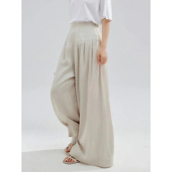 Elegant high-waisted wide-leg trousers for stylish women, featuring a unique patchwork design and premium cotton-polyester blend fabric