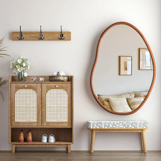 Stylish mid-century asymmetric decorative wall mirror with solid beech wood frame, adding visual interest and reflecting light to create a brighter, more open living space.