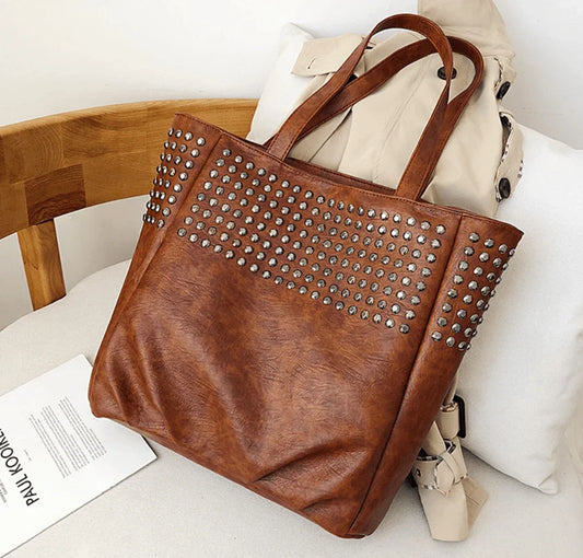 Premium British leather tote bag in black, featuring a large capacity design and stylish, versatile appeal.