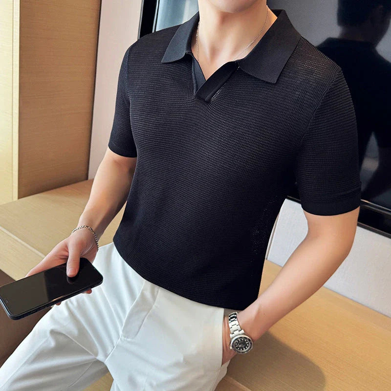 A premium cotton blend polo shirt in classic colours, featuring a v-neck lapel collar and slim fit design for a sophisticated casual look.