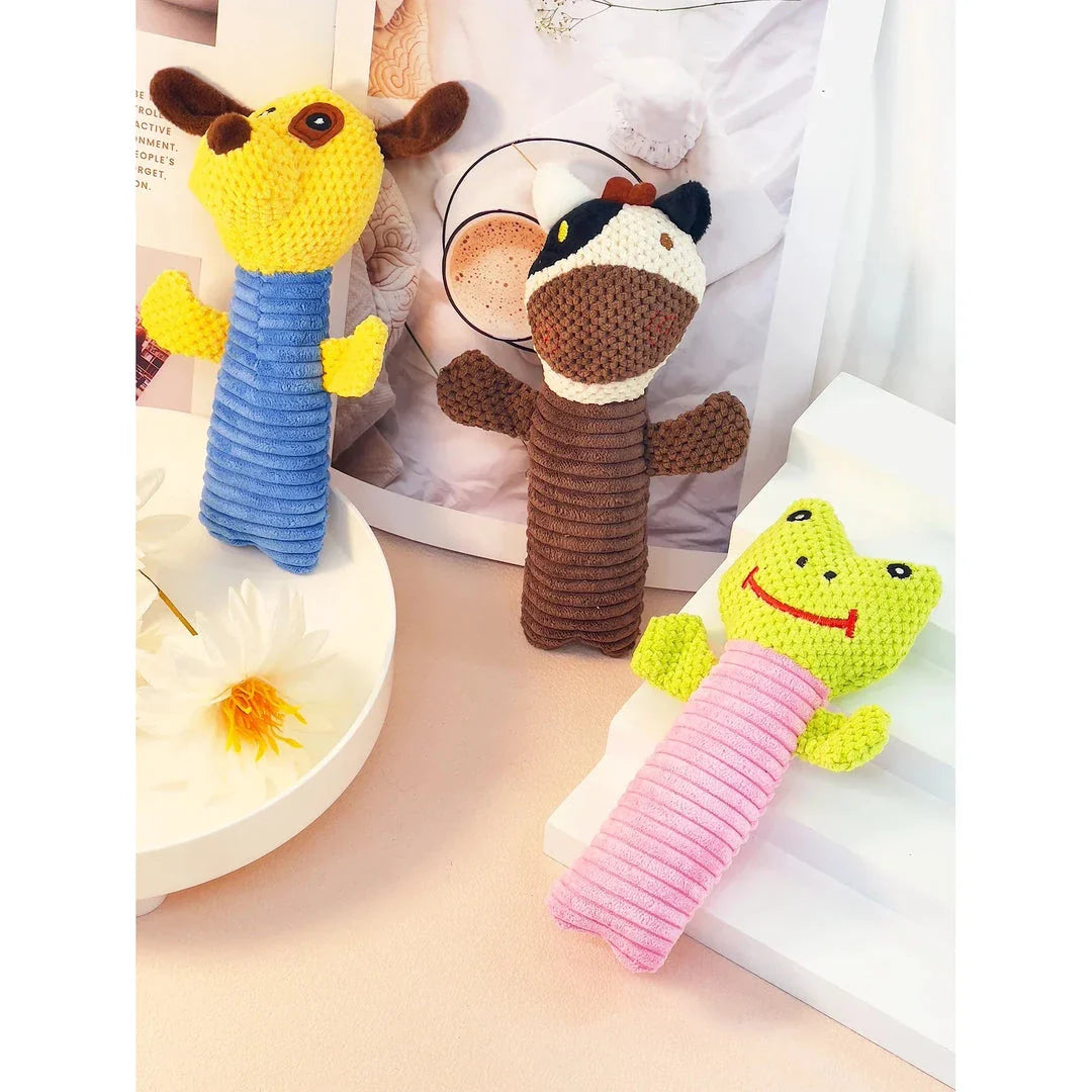 Interactive plush dog toys in the shape of corn kernels and dog figures, made of soft fleece material with built-in squeakers for endless playtime fun.