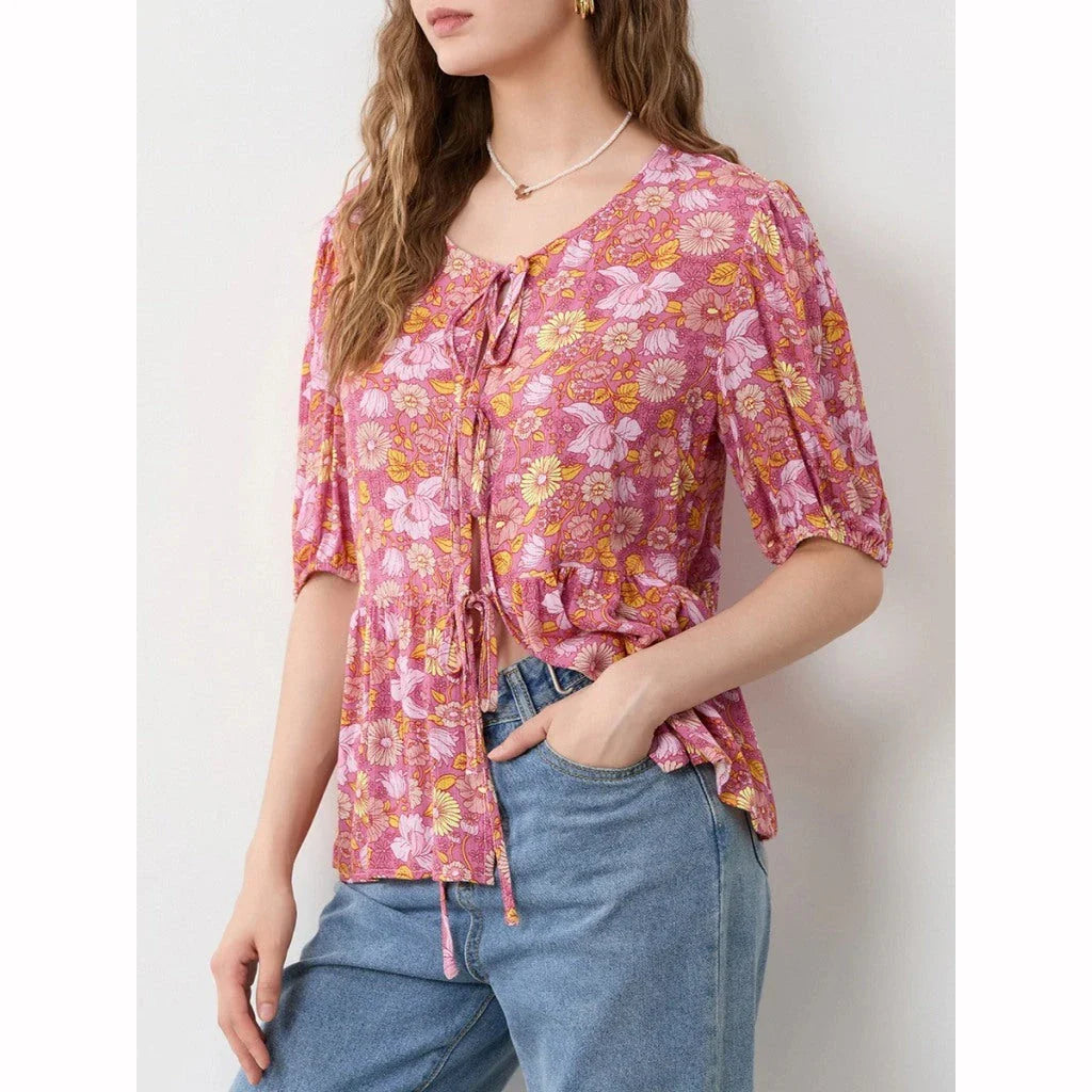 Elegant floral lace blouse with bow v-neck, showcasing vintage charm and modern comfort
