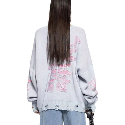 A stylish ripped long sleeve top in a variety of versatile colours, including grey, green, and black.