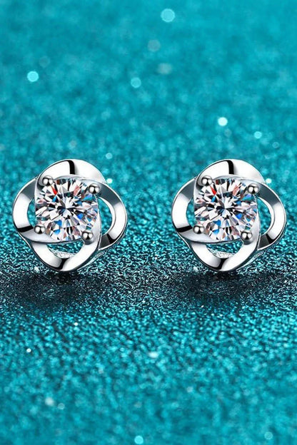 Pair of rhodium-plated moissanite stud earrings with a sleek, minimalist design